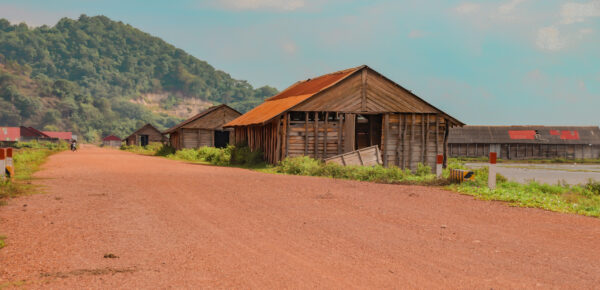 A beautiful view of several wooden barns in the countryside